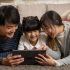 Asian Family watching online video content