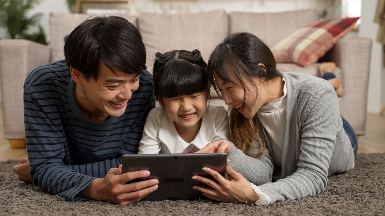 Asian Family watching online video content