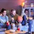Men at home watching basketball