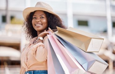 woman with retail shopping bags