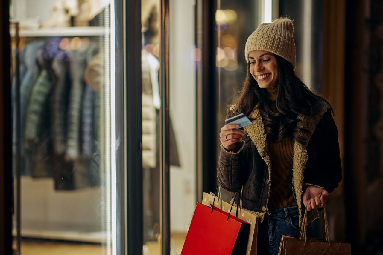 Woman holiday shopping in the city