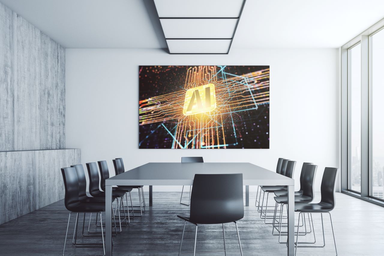 AI on screen in conference room