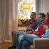 Young viewers watching tv and on their phones